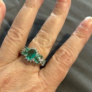Beautiful costume ring. Sea foam green and diamond colored stones. New, size 7